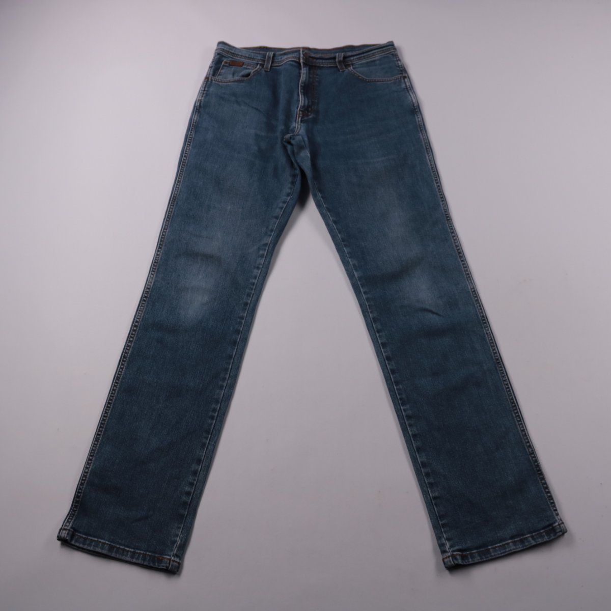 джинсы Wrangler